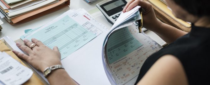 Adult asian woman working on payment bills accounting summary da